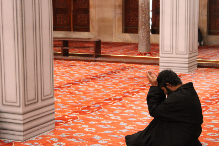 A man praying to Allah